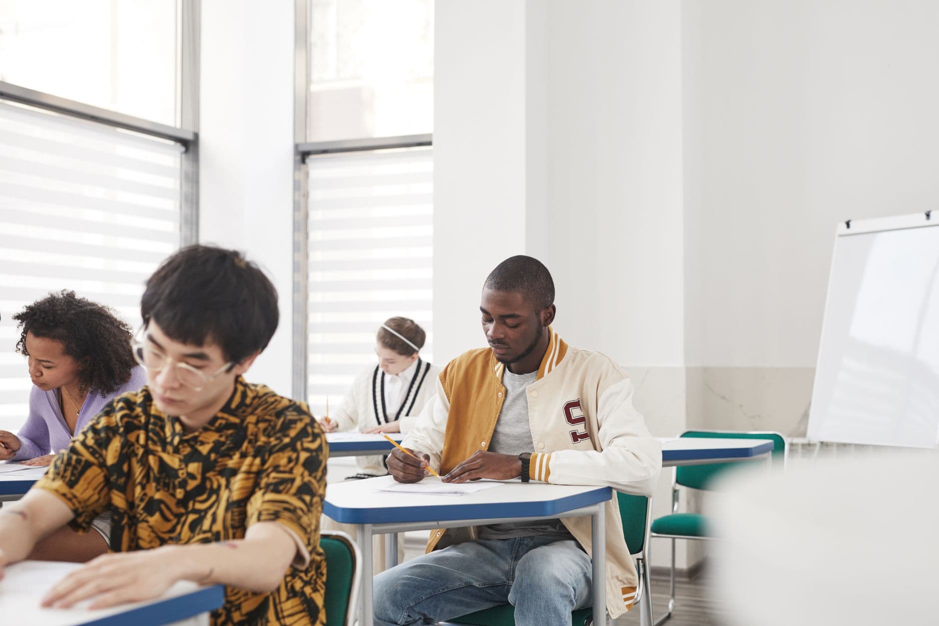 Students sitting an exam in a classroom